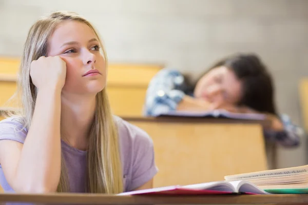 depositphotos_98045028-stock-photo-bored-student-listening-while-classmate