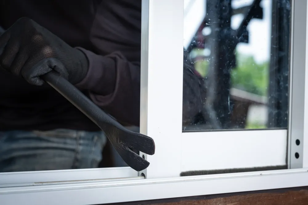 thieves-wear-black-hats-pry-windows-steal-things