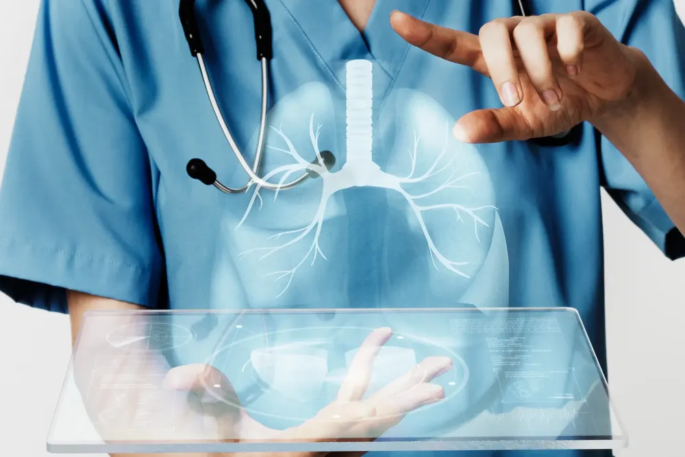 doctors-using-transparent-tablet-with-hologram-medical-technology-edited-scaled